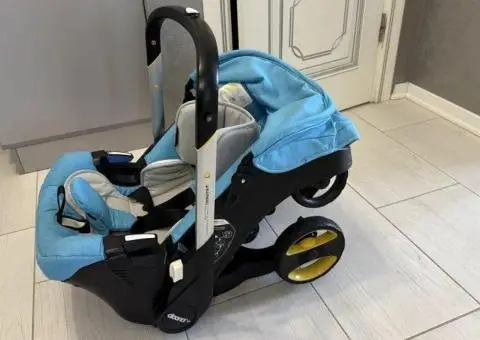 Продам коляску - автокресло Doona + - 1/3