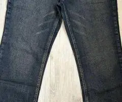 Balenciaga Flared Jeans — Deep Indigo Wash