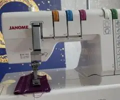 Розпошивальна машина Janome CoverPro 7000CPS