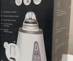 стерилізатором пляшечок Nuvita NV1170.
