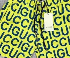 Чоловічі купальні шорти Lacoste та Gucci
