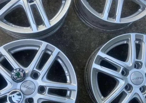 Alloy wheels Dezent R15 5x112 ET43 (Skoda, VAG) — Set of 4 pcs.
