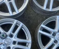 Alloy wheels Dezent R15 5x112 ET43 (Skoda, VAG) — Set of 4 pcs.