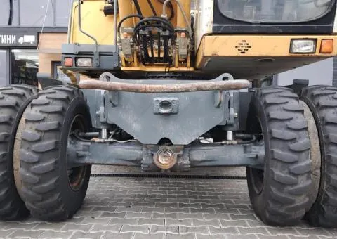 Liebherr A 312 Litronic wheeled excavator, Rivne - 5/10