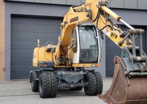 Liebherr A 312 Litronic wheeled excavator, Rivne - 6/10