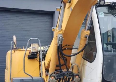 Liebherr A 312 Litronic wheeled excavator, Rivne - 7/10