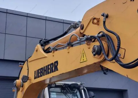 Liebherr A 312 Litronic wheeled excavator, Rivne - 8/10