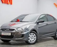 Hyundai Accent 2013, 1.4 L petrol, manual, front-wheel drive, 194,700 km, Kyiv