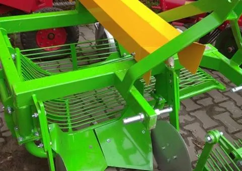 Однорядна вібраційна картоплекопачка з викидом набік до трактора Бомет-655 - 7/9
